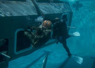 Underwater egress training equipment in operation